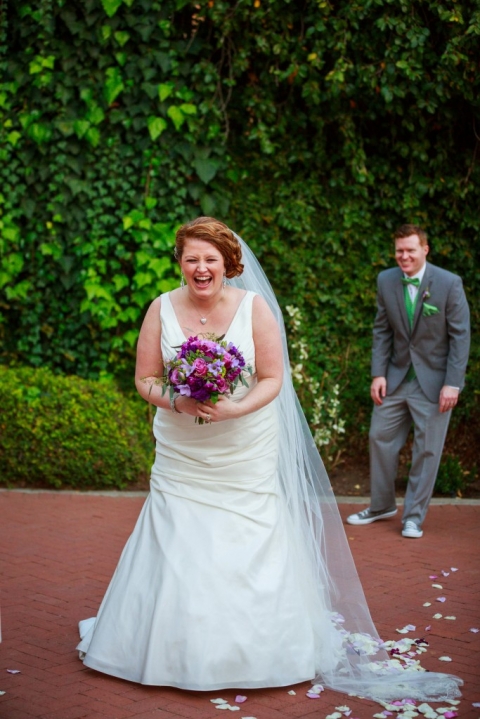 silly groom and bride laughing