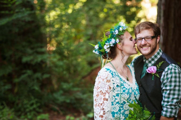 couple whispering and smiling