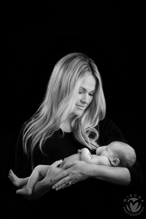 mama with newborn studio portrait